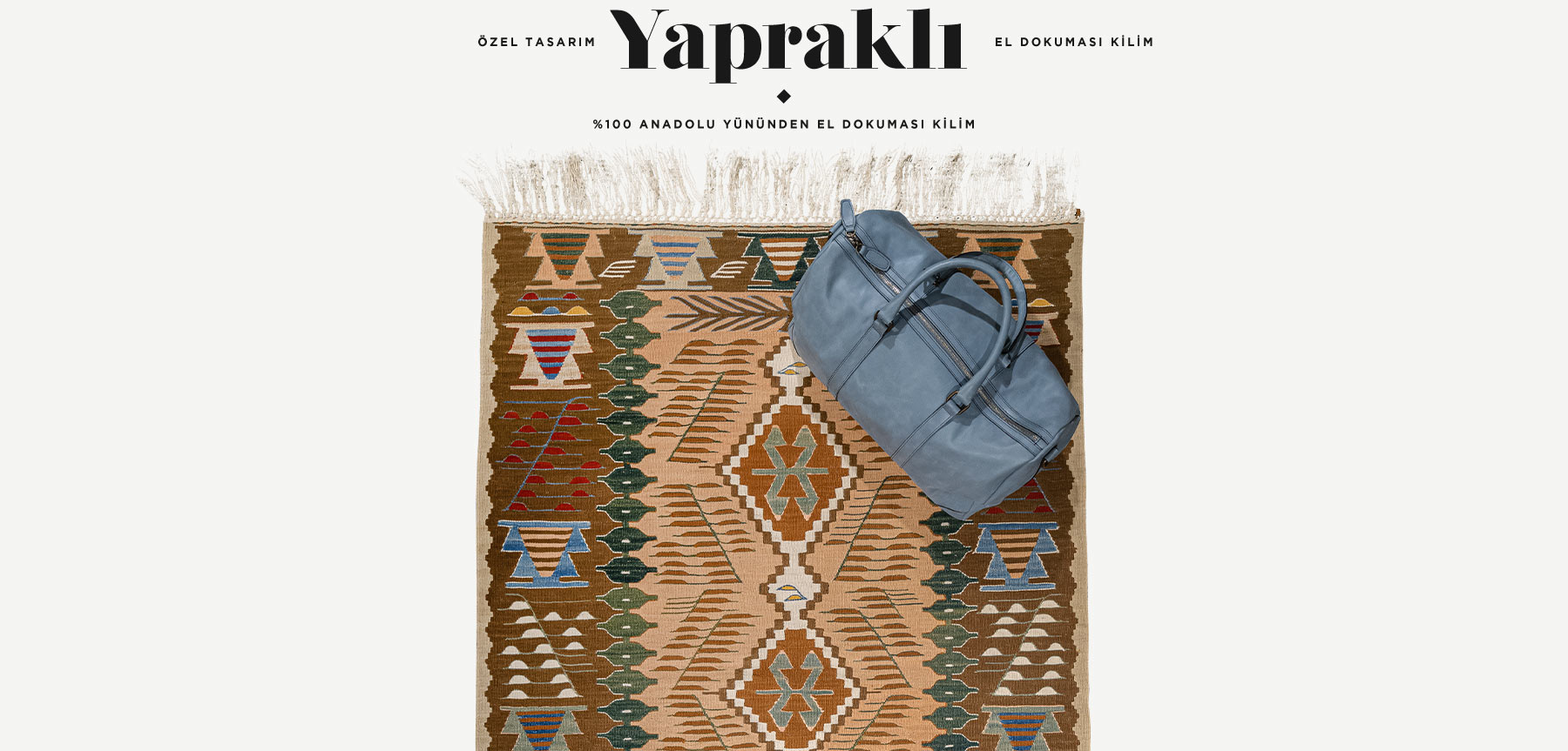 yapraklı el dokuması kilim 1,97 m2'in resmi